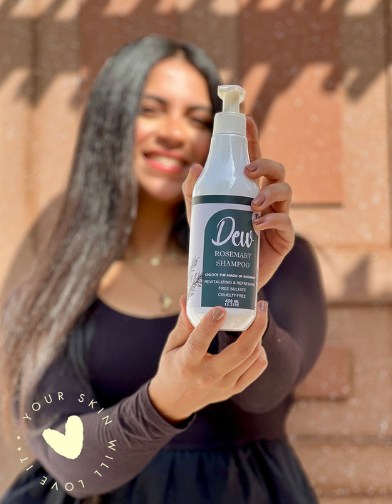 Person using Dew Skincare Rosemary Shampoo in the shower, demonstrating its gentle lather and refreshing scent